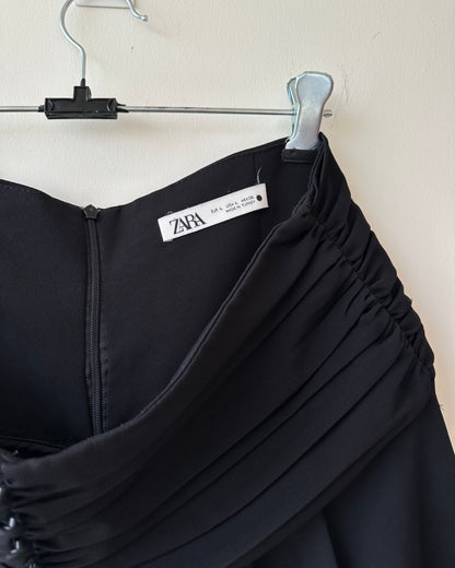 Black pleated high waist shorts with buttons