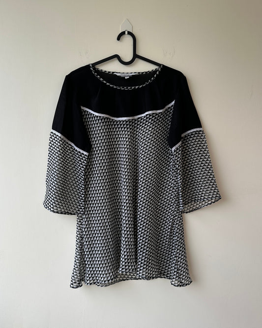 Black and white sheer top with bell sleeves