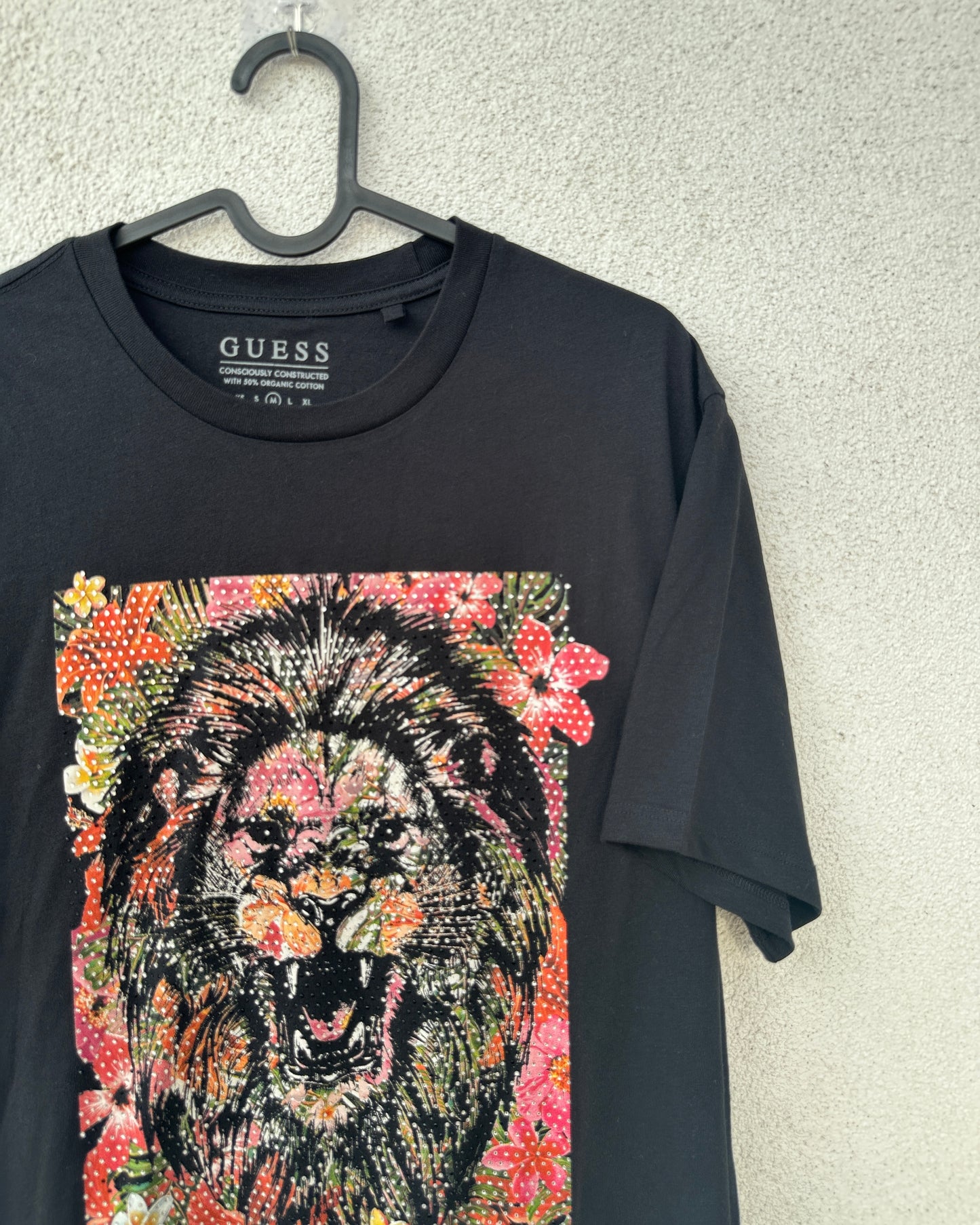 Black T shirt with lion embellishment