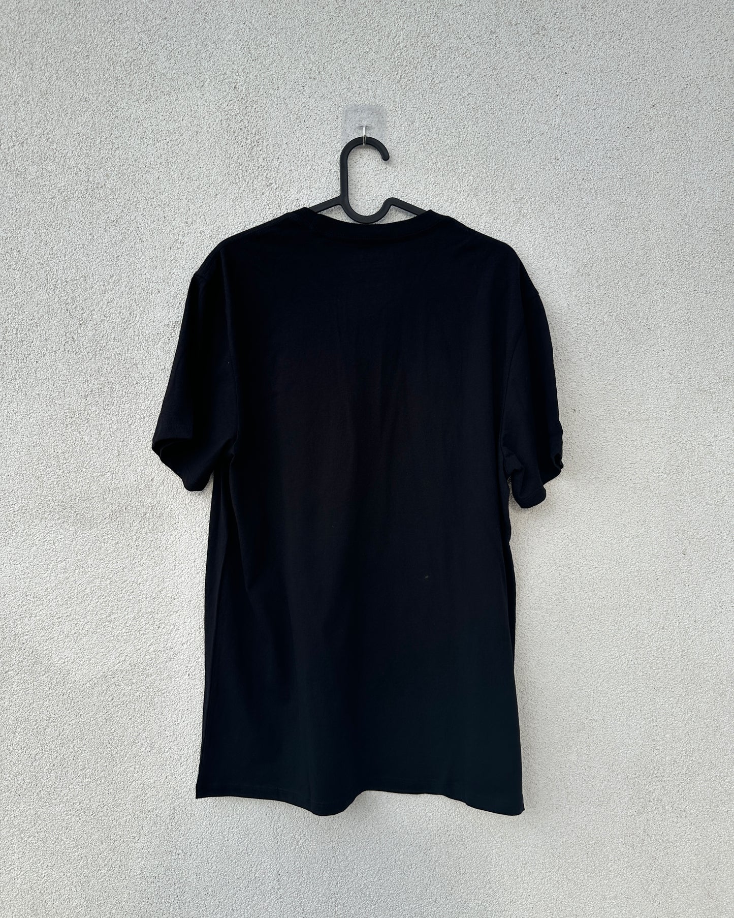 Black T shirt with lion embellishment