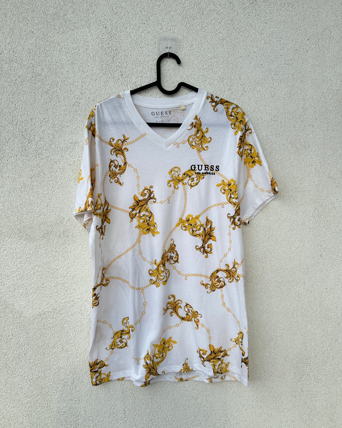 White T shirt with yellow print