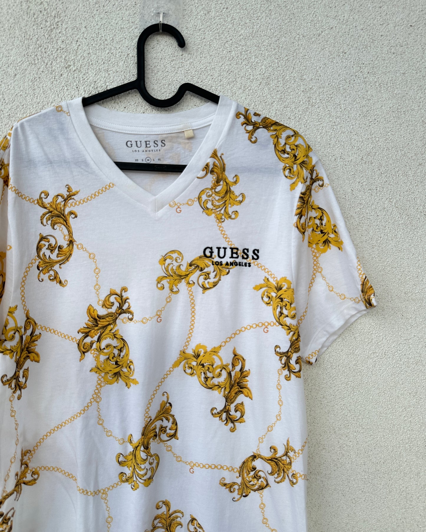 White T shirt with yellow print