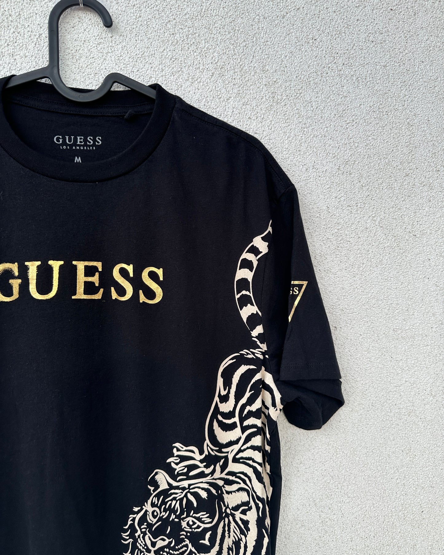 Black T shirt with lion and rose patchwork