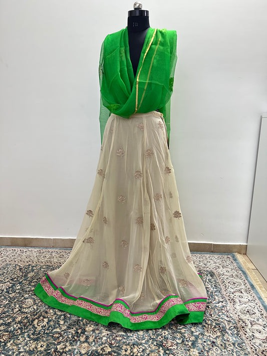 Beige lehenga with green dupatta