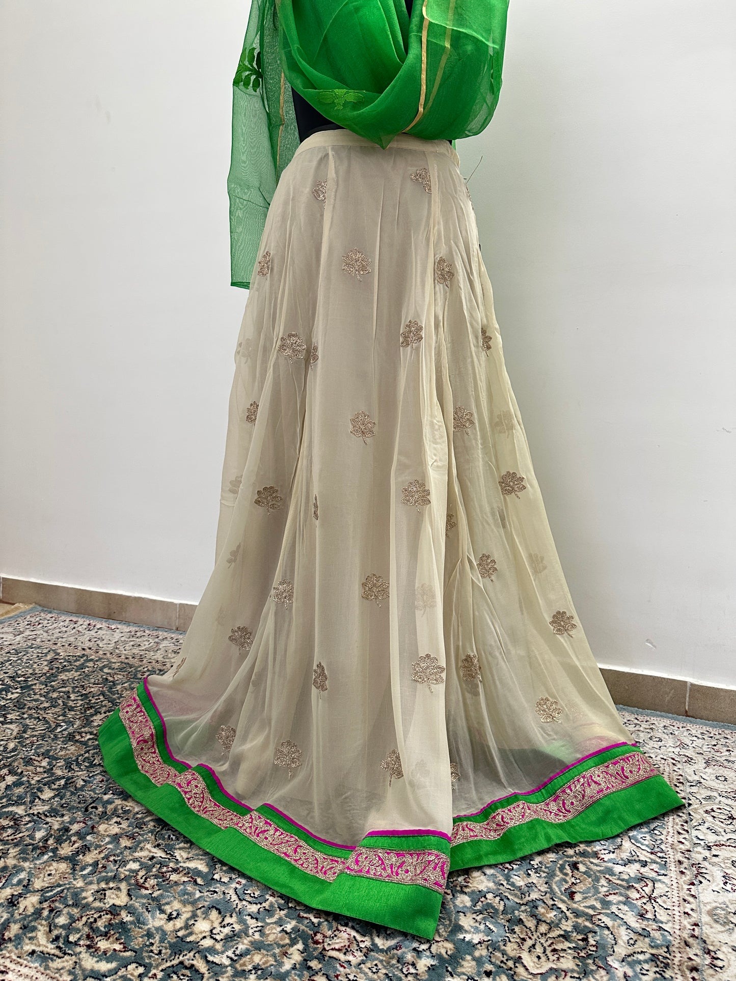 Beige lehenga with green dupatta