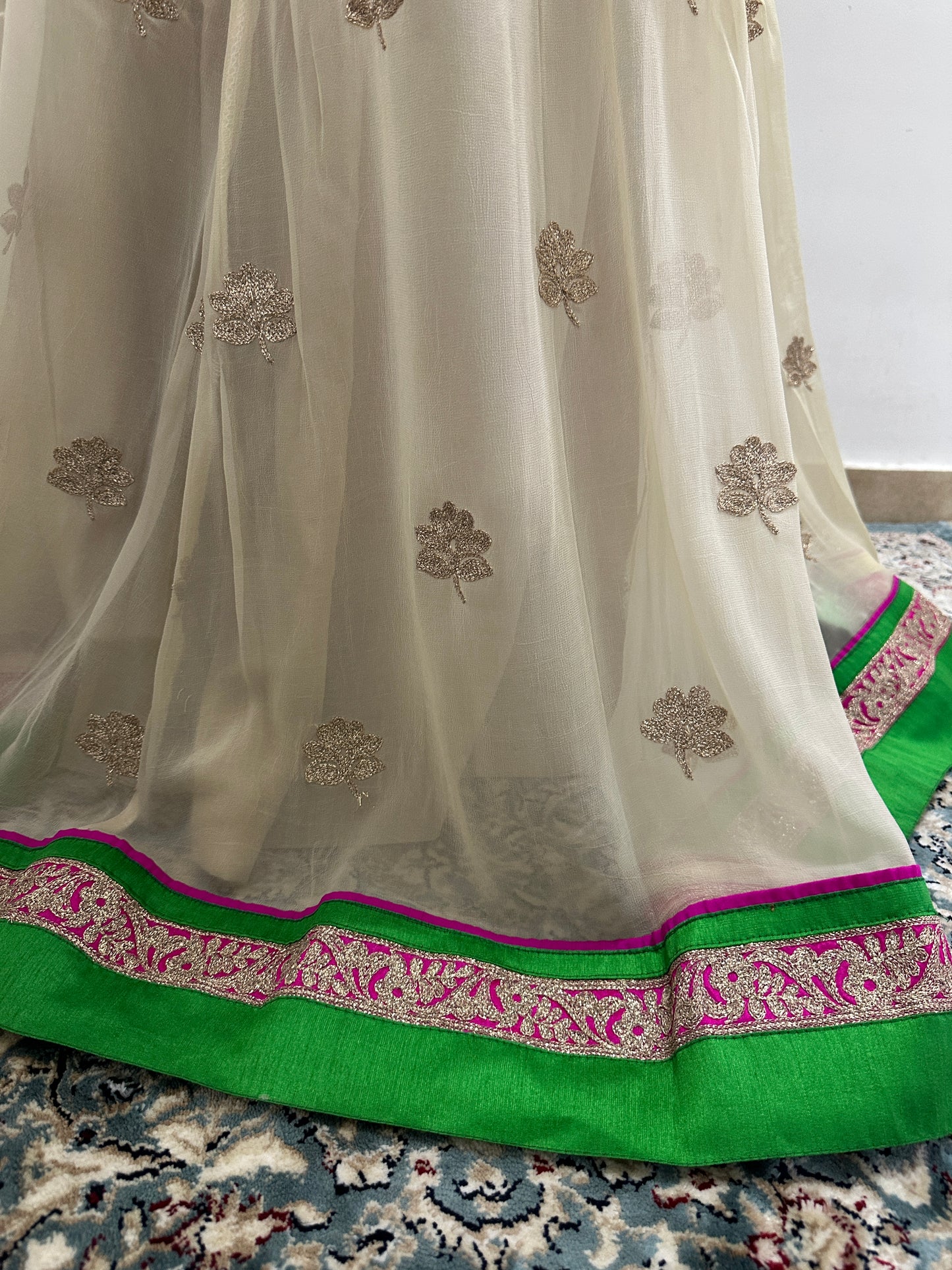 Beige lehenga with green dupatta
