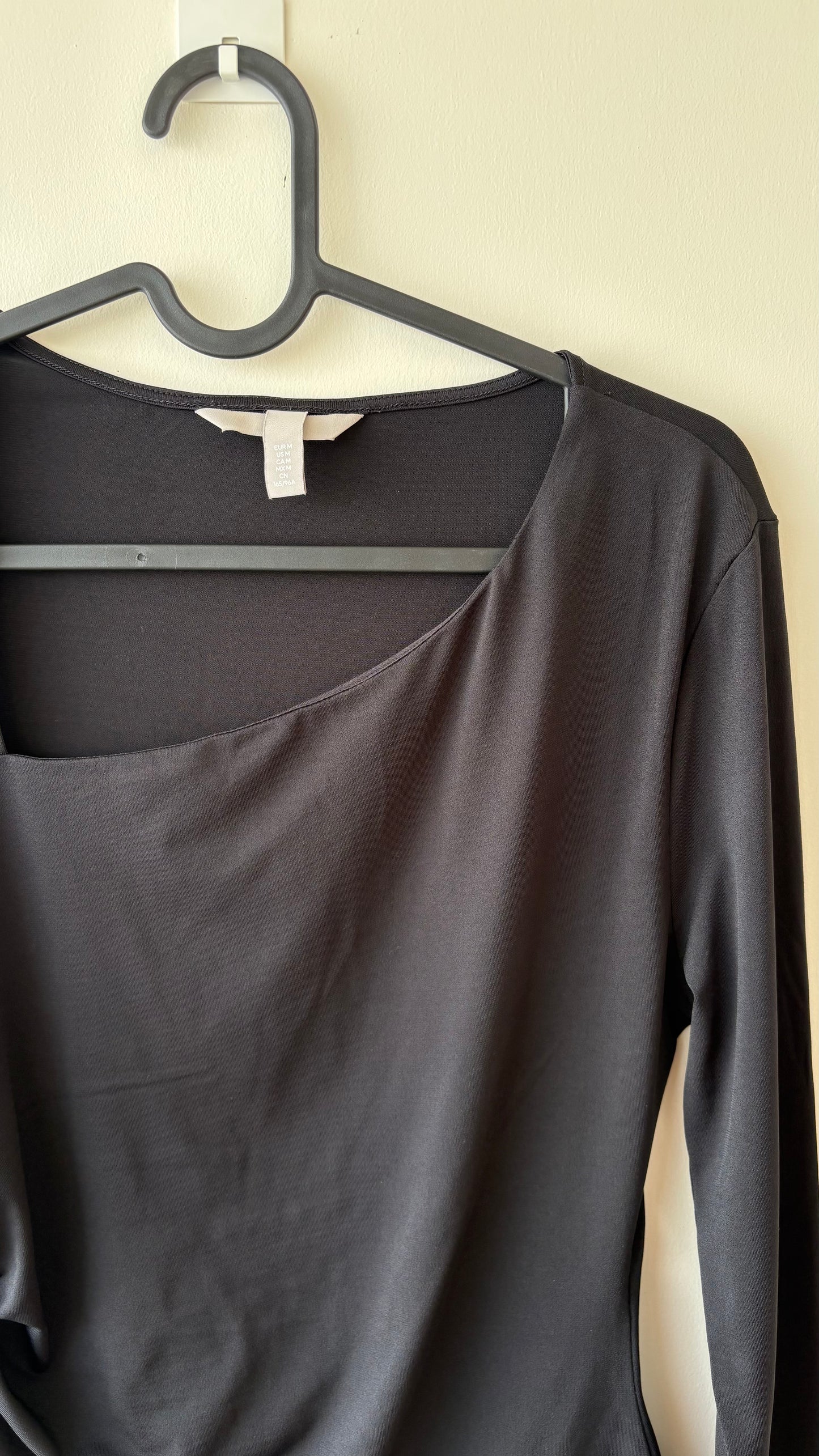 Asymmetric neck black ruched bodysuit