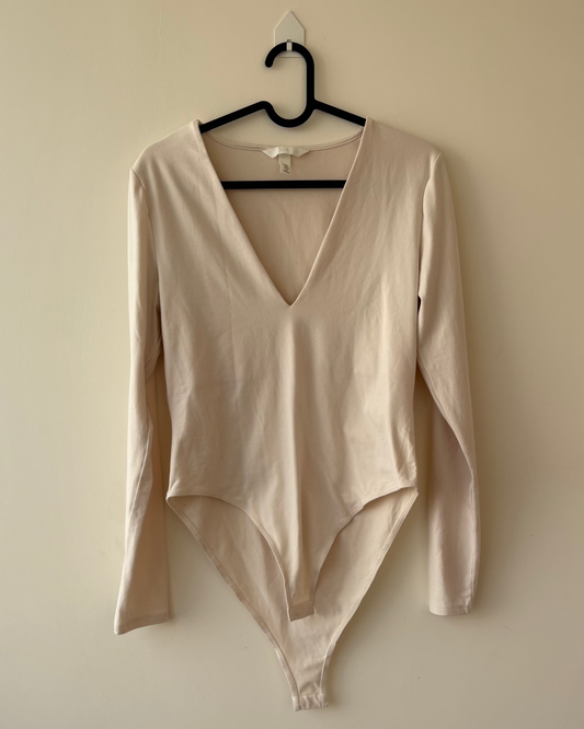 Beige V-neck bodysuit top