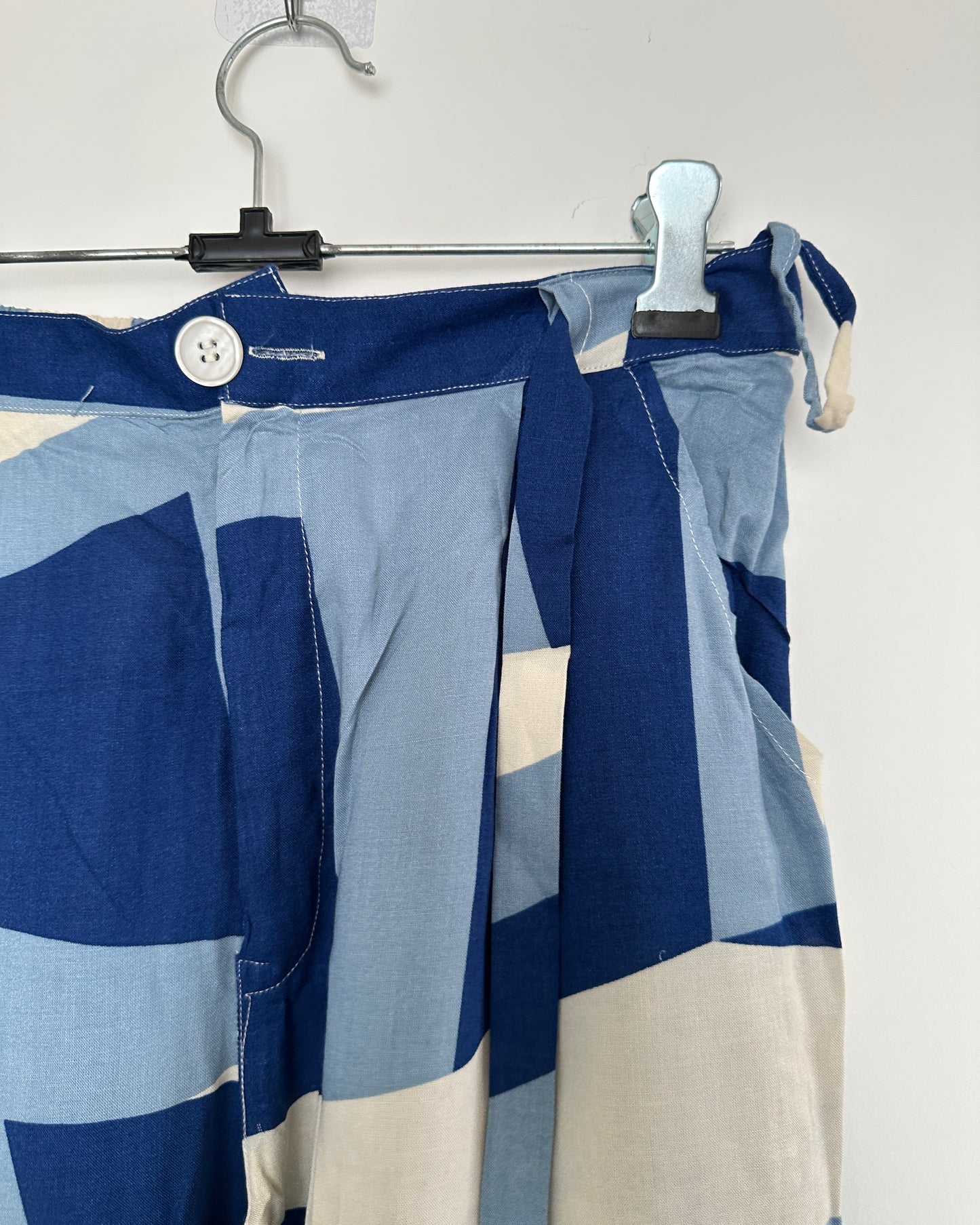 Blue and beige abstract print pants