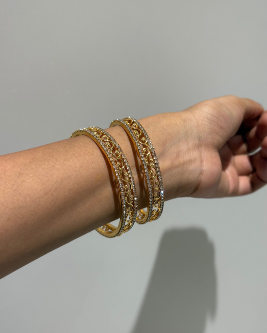 Gold filigree patterned bangles