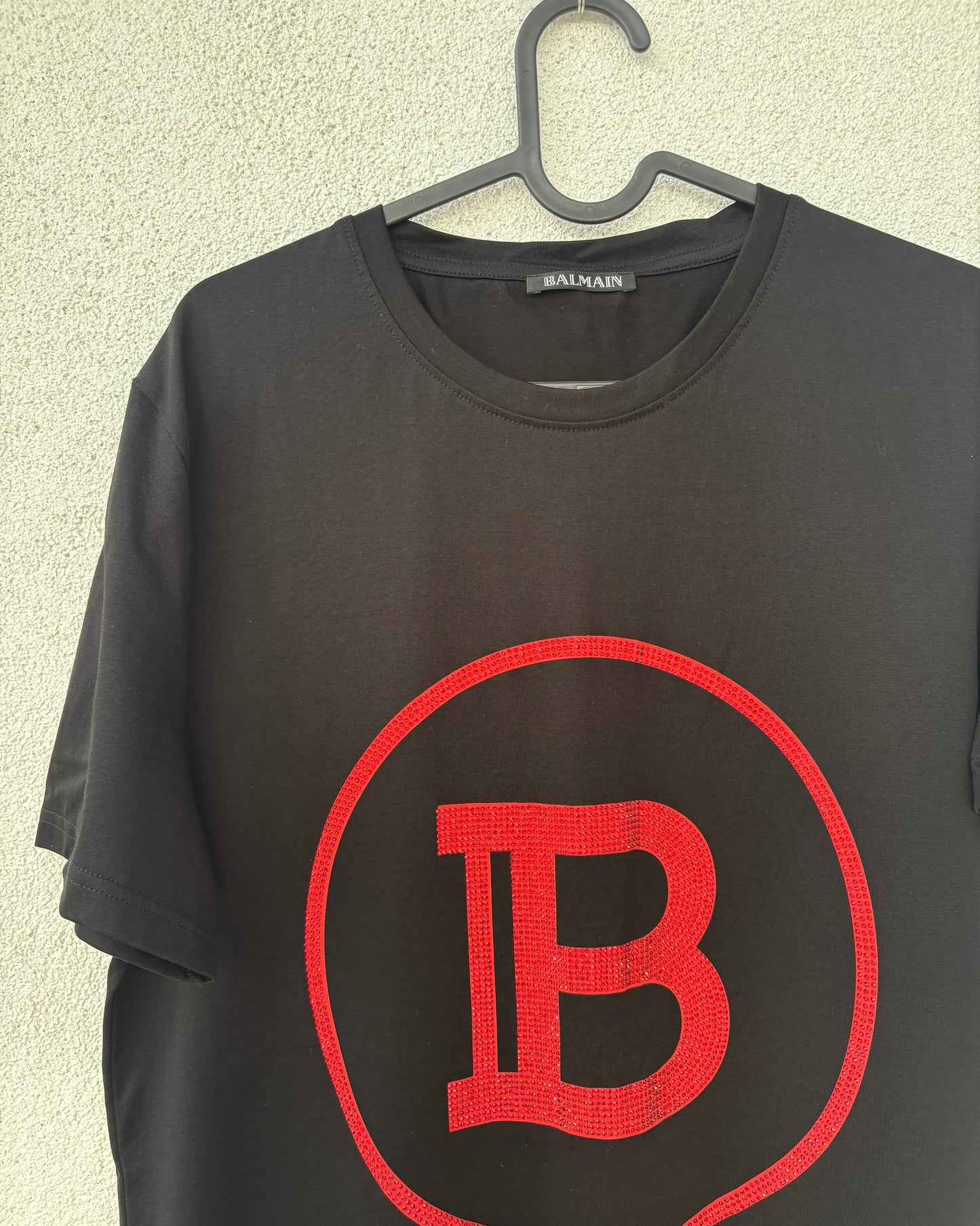 Black T-shirt with embellished logo