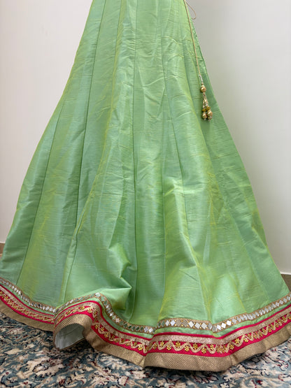 Green lehenga with pink border