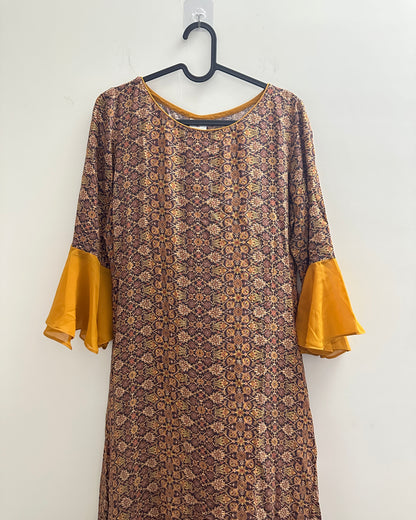 Mustard yellow and brown kurta with front slit , flutter sleeves and trims