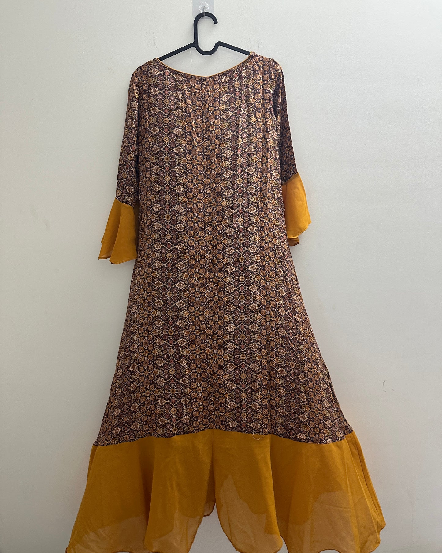 Mustard yellow and brown kurta with front slit , flutter sleeves and trims