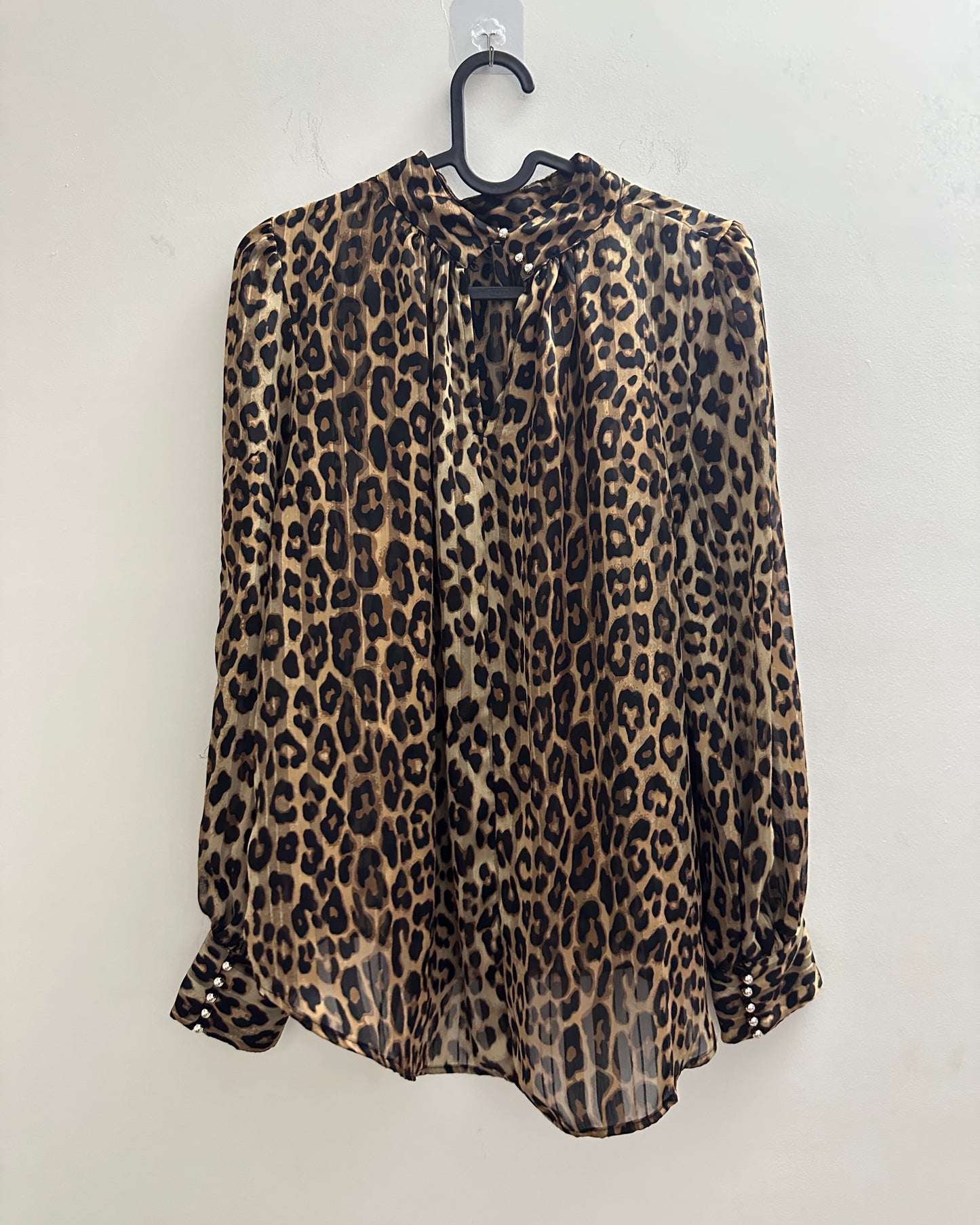 Animal print blouse with gold buttons