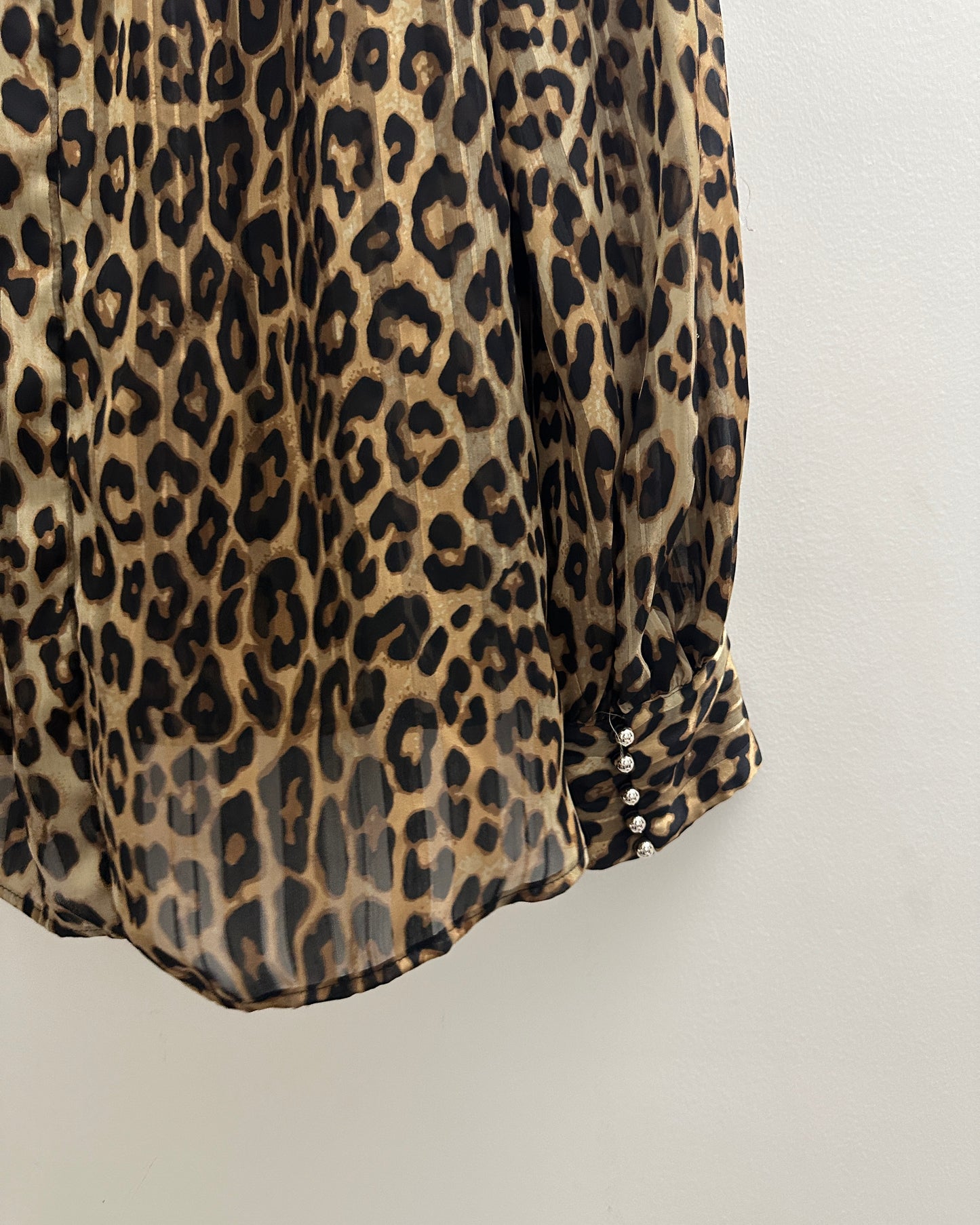 Animal print blouse with gold buttons