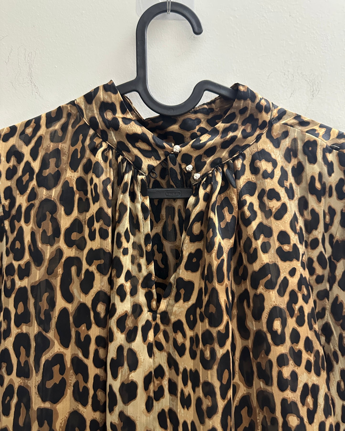 Animal print blouse with gold buttons