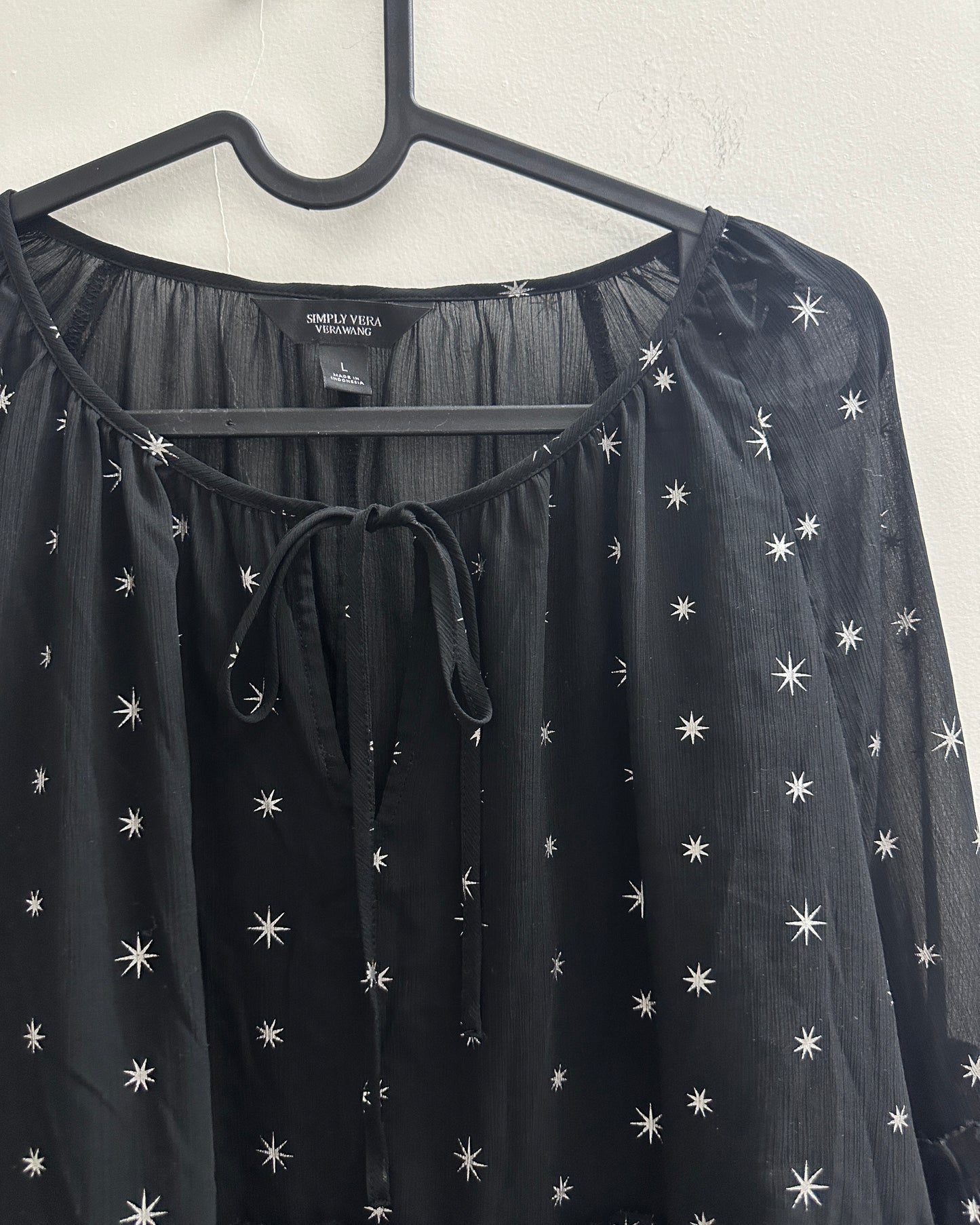 Black blouse top with white star print