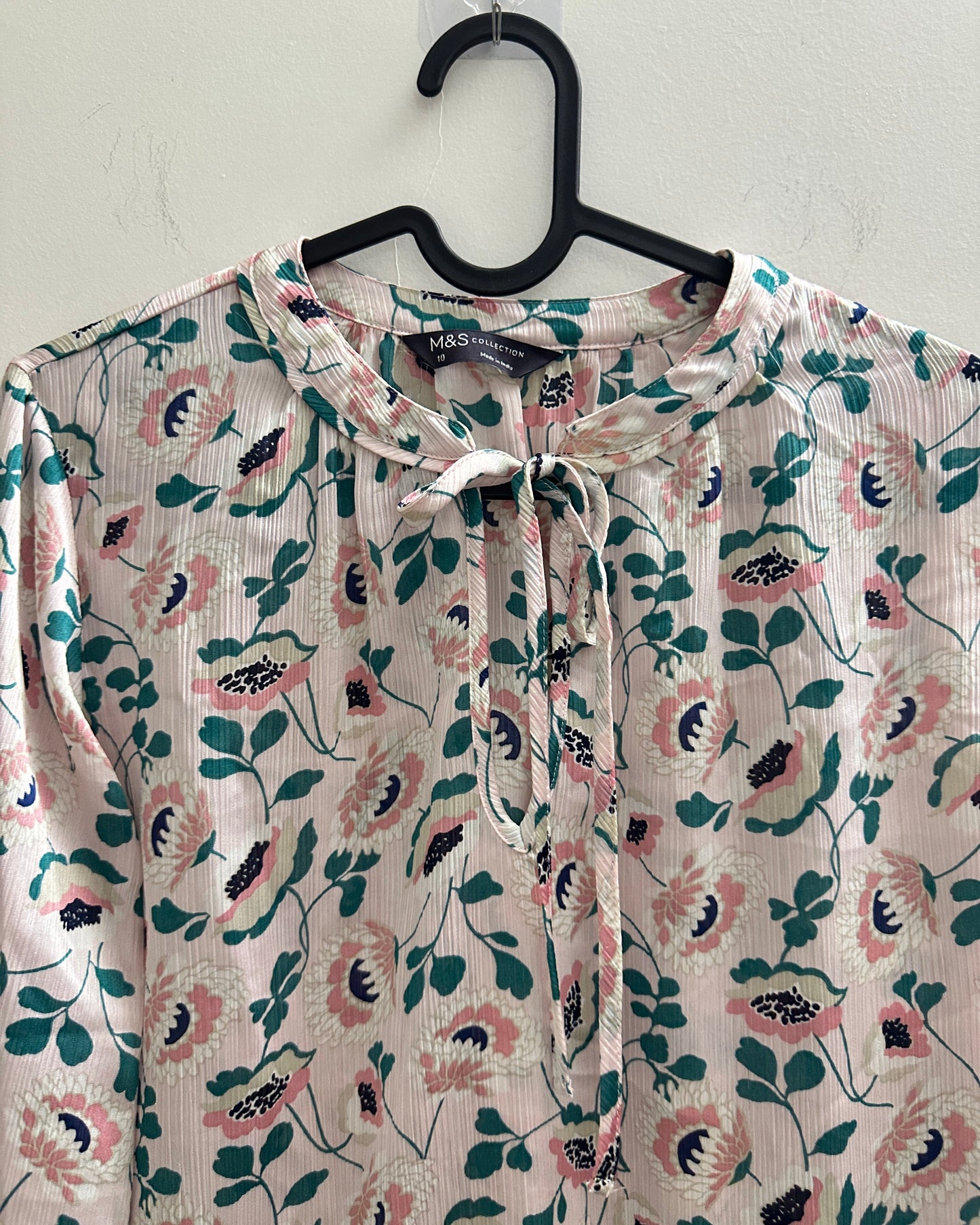Pastel pink blouse top with floral print