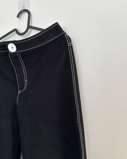 Black stretchable trousers with contrast white stitch