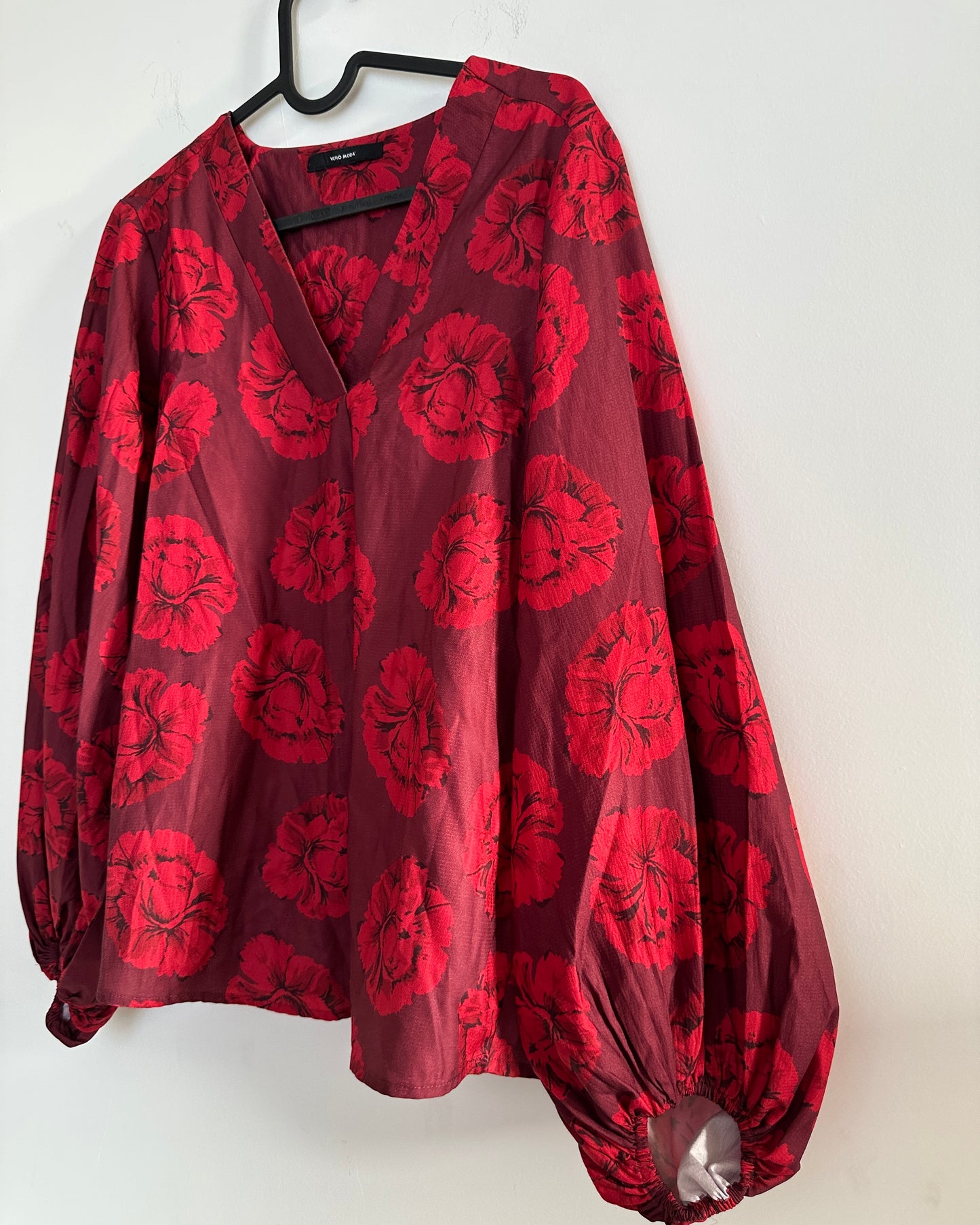 Red and maroon V-neck floral blouse