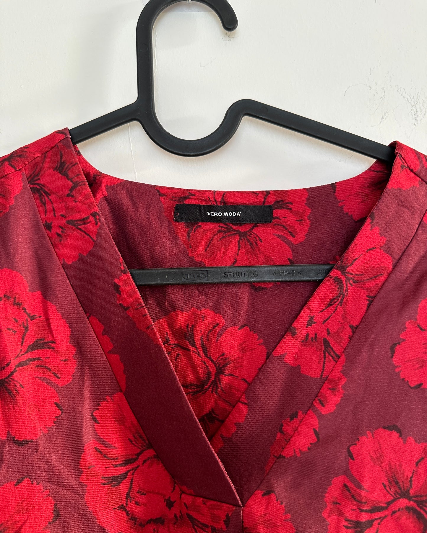 Red and maroon V-neck floral blouse