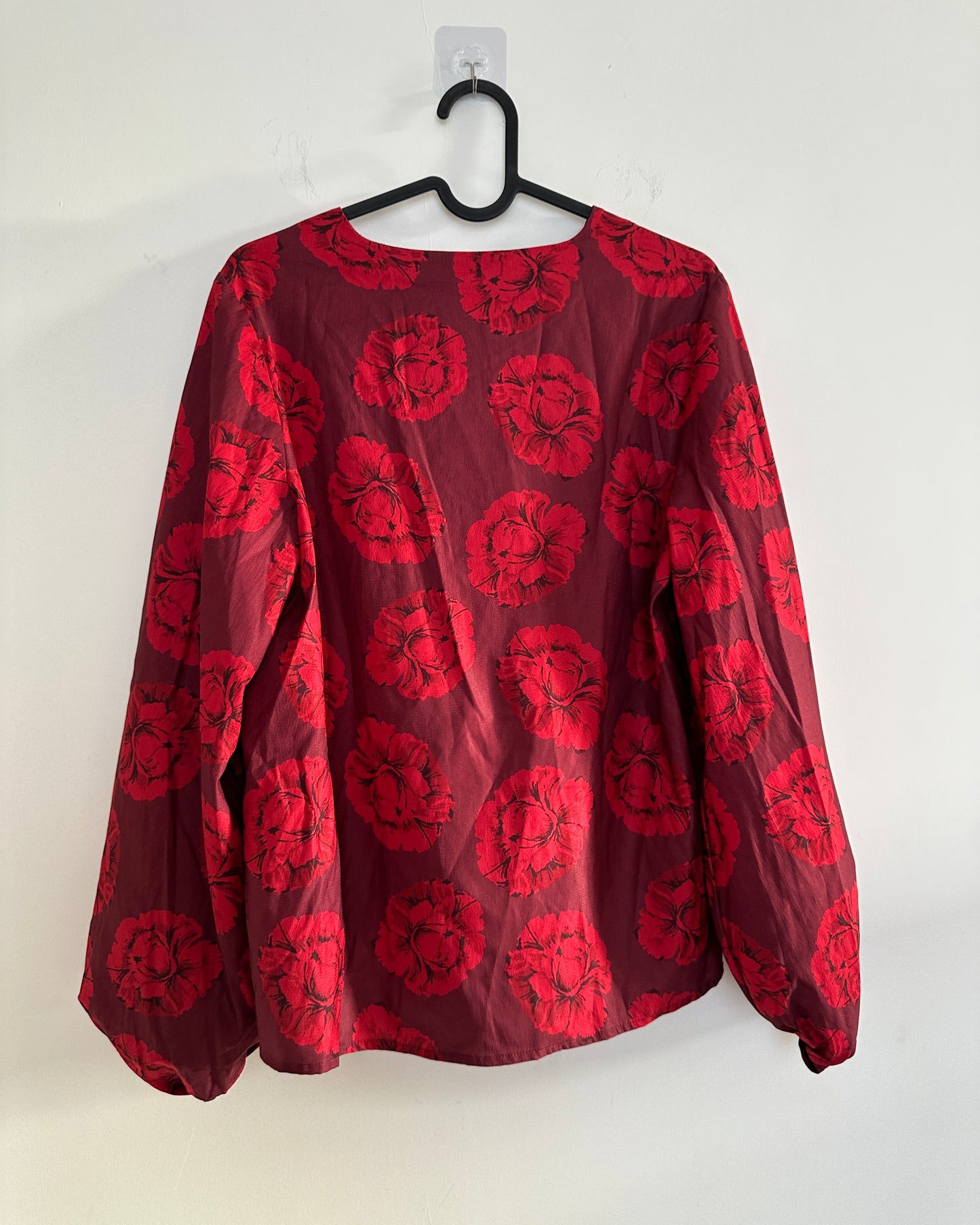 Red and maroon V-neck floral blouse