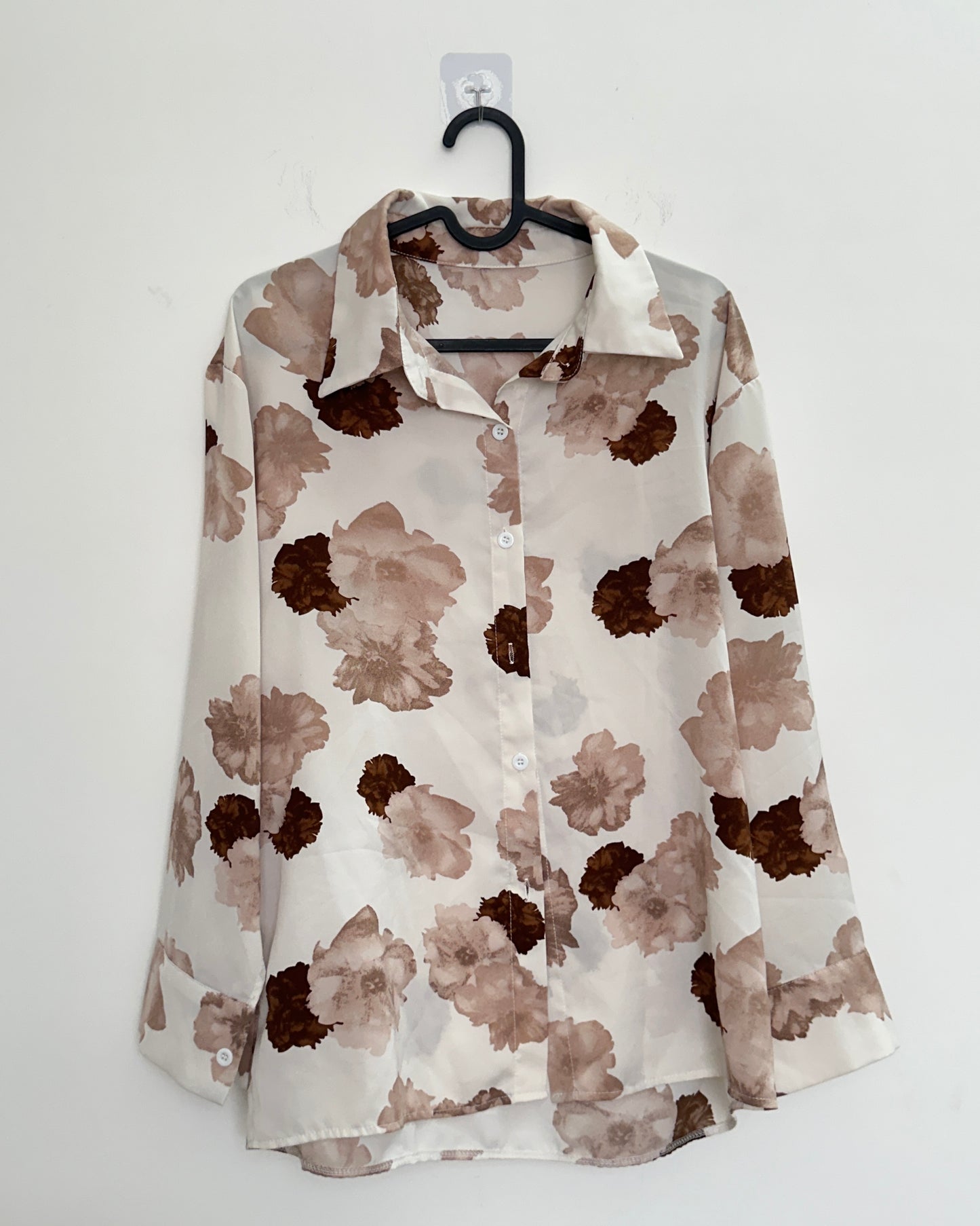 White and brown floral shirt