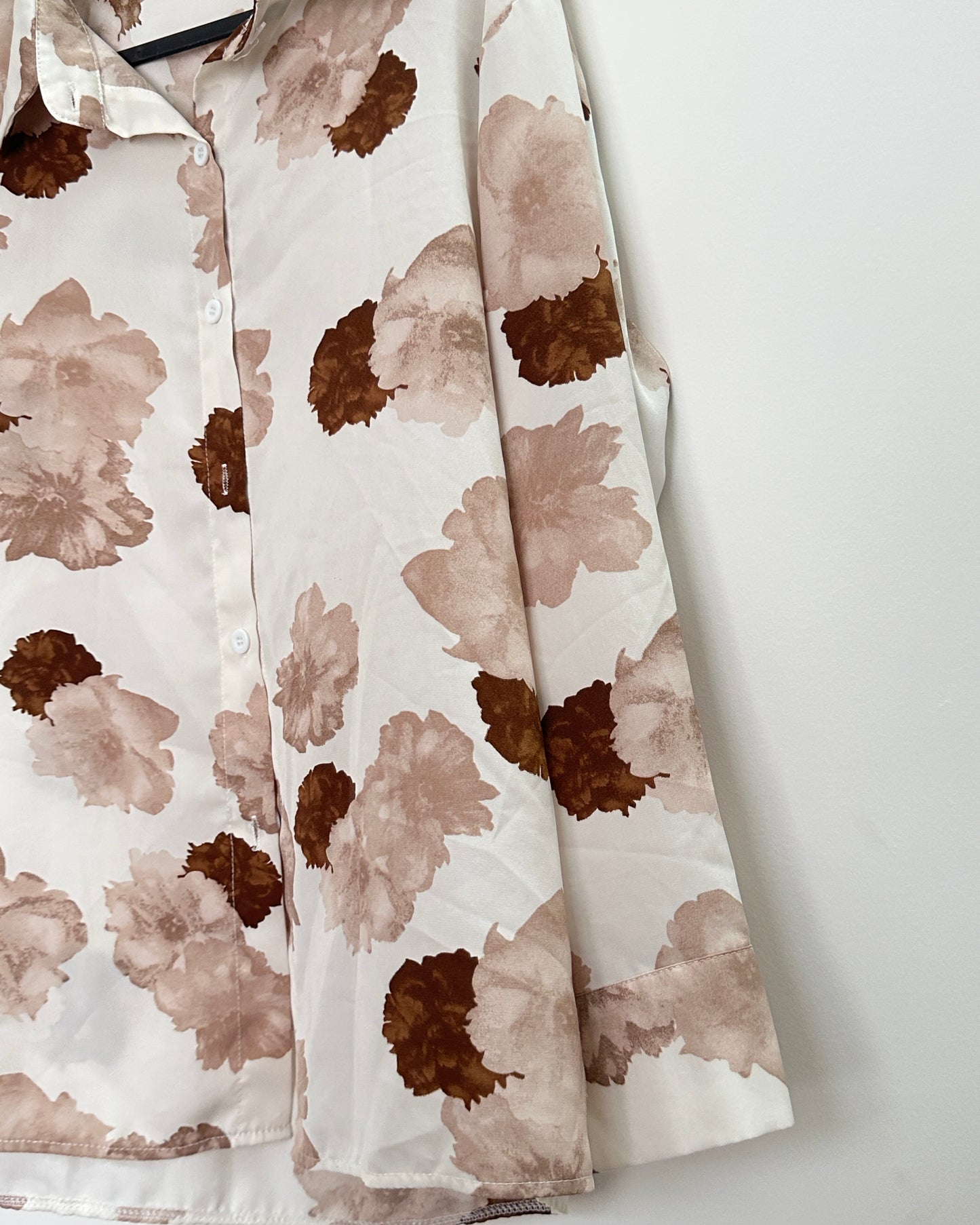 White and brown floral shirt