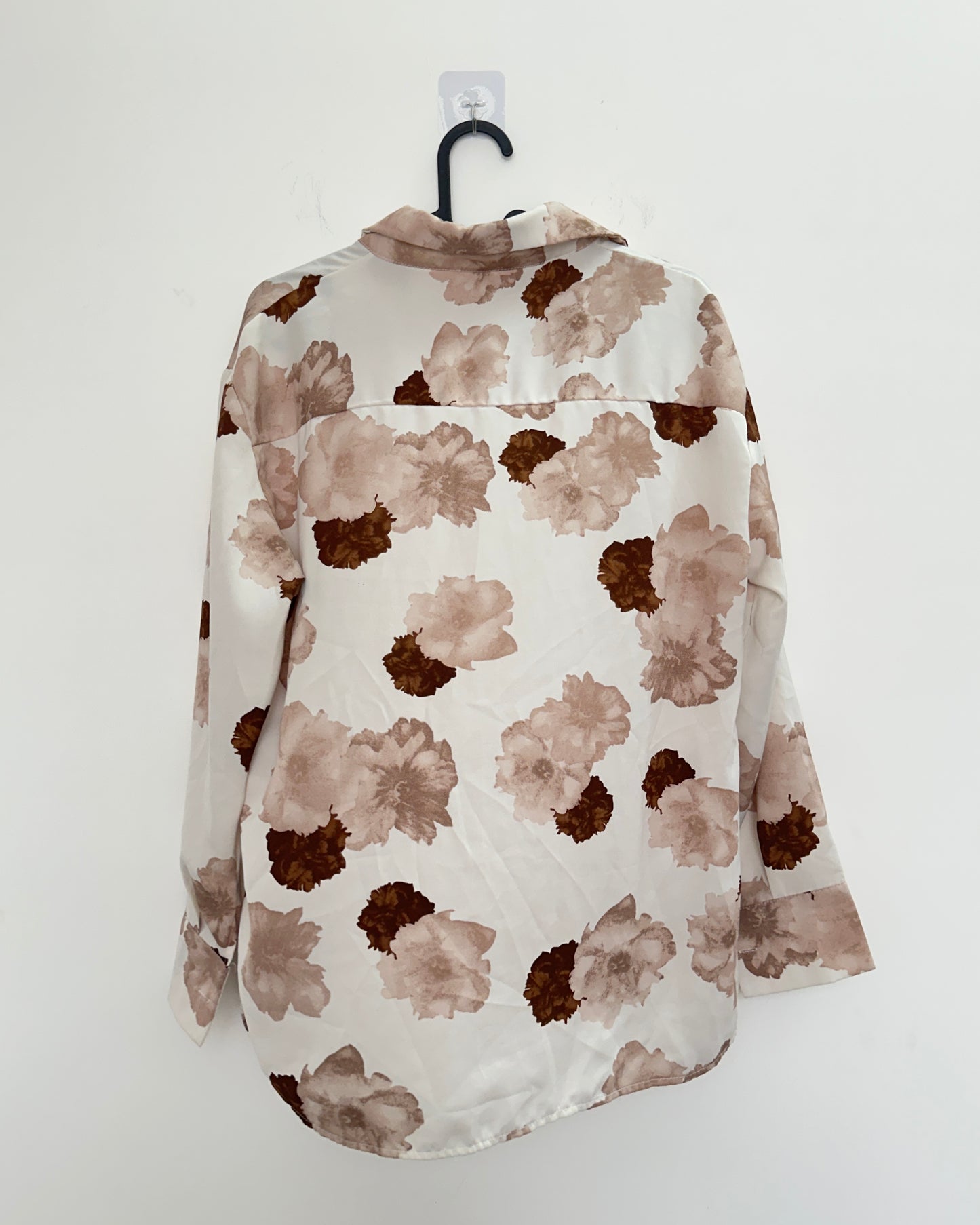 White and brown floral shirt