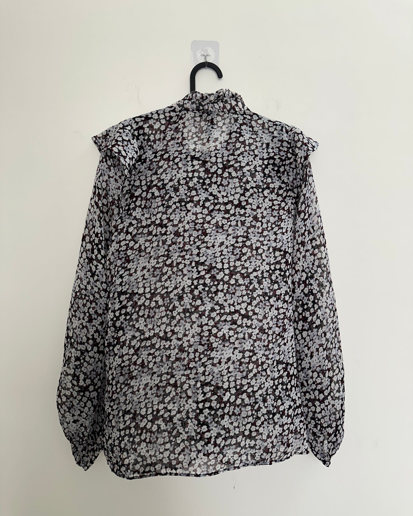 Black floral blouse with ruffles