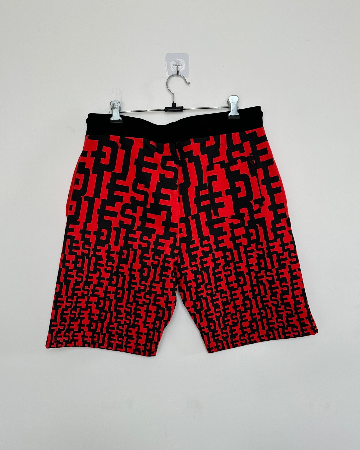 Red and black graphic print men's shorts