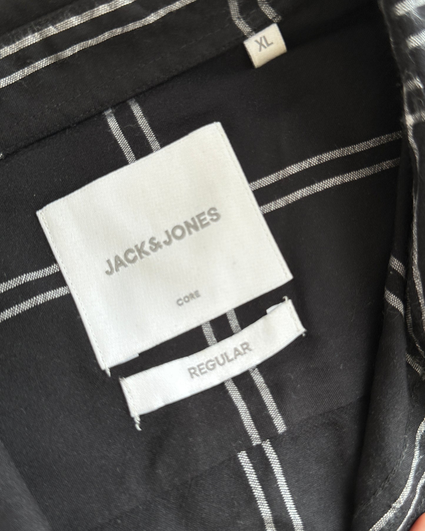 Black shirt with white checks