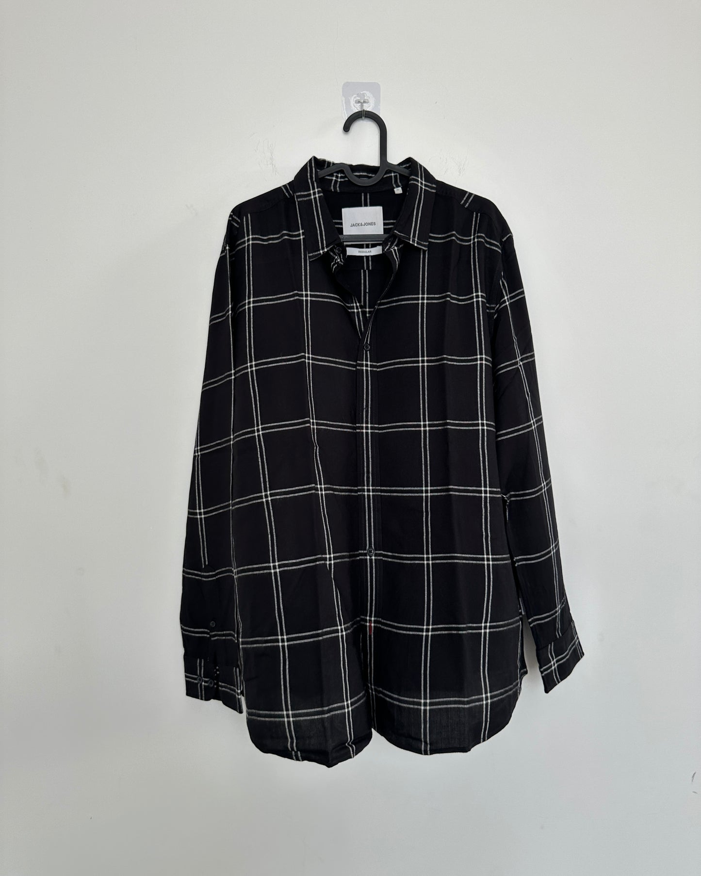 Black shirt with white checks