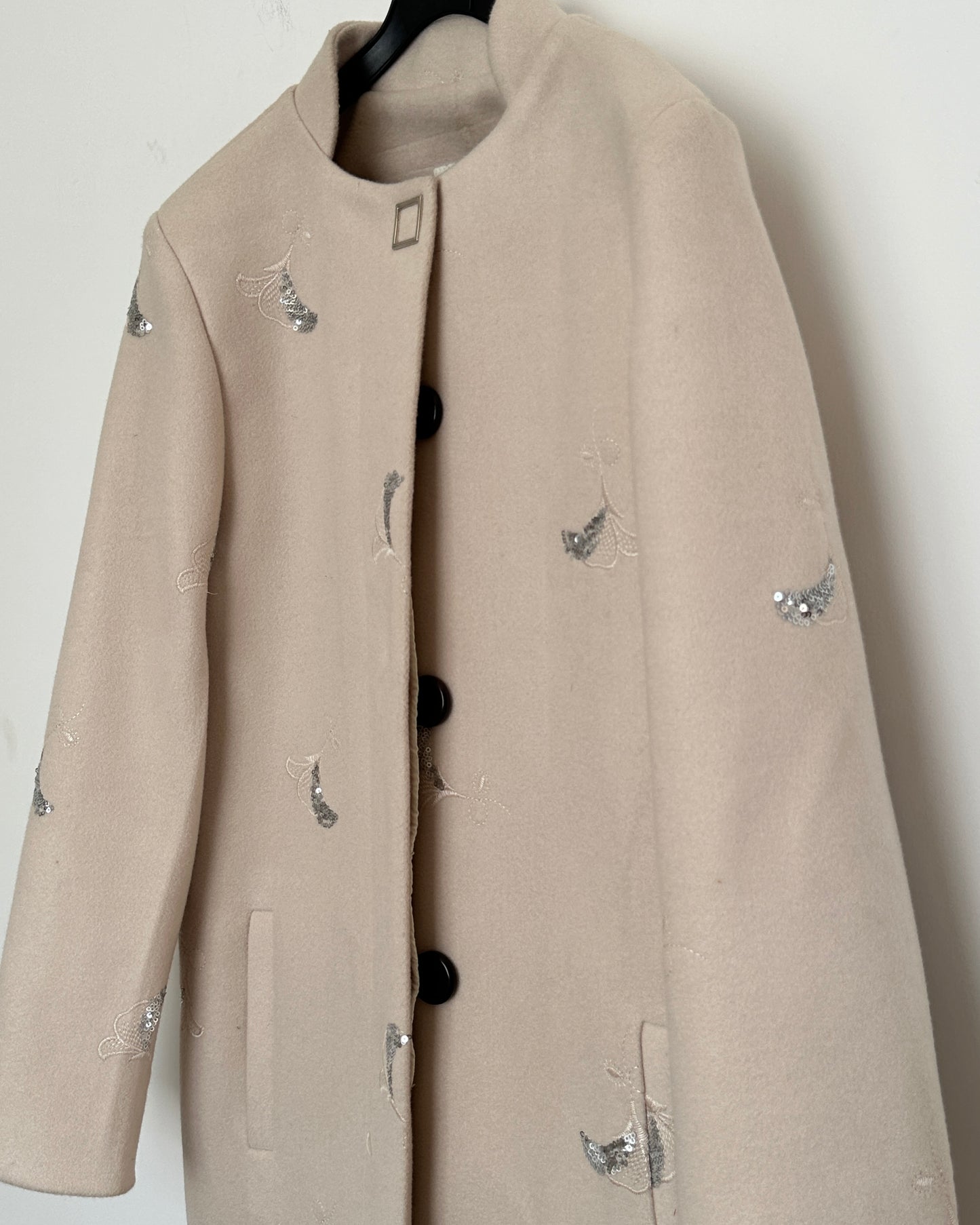 Beige winter coat with silver embroidery