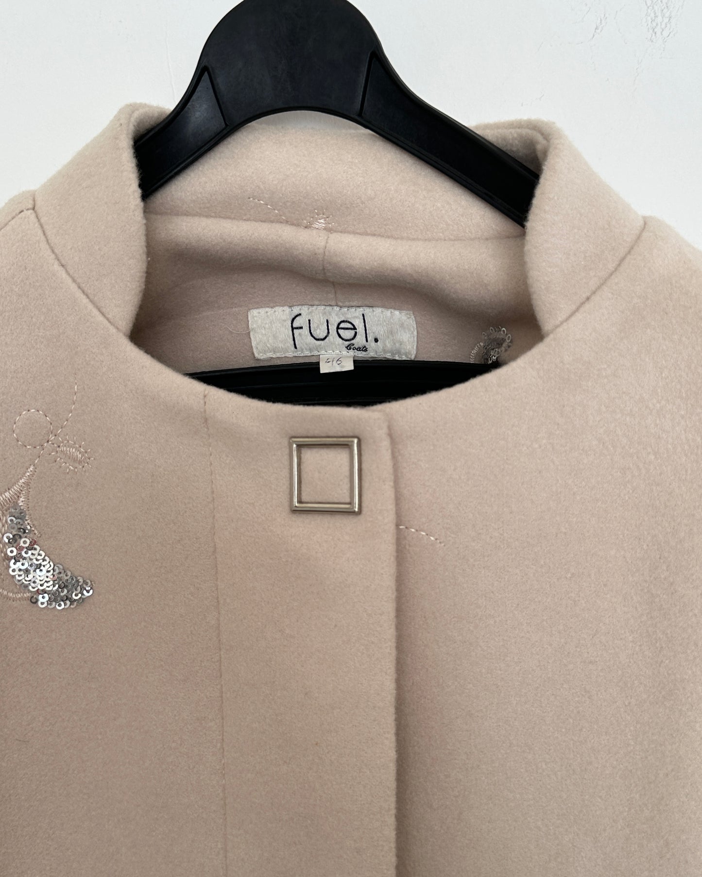 Beige winter coat with silver embroidery