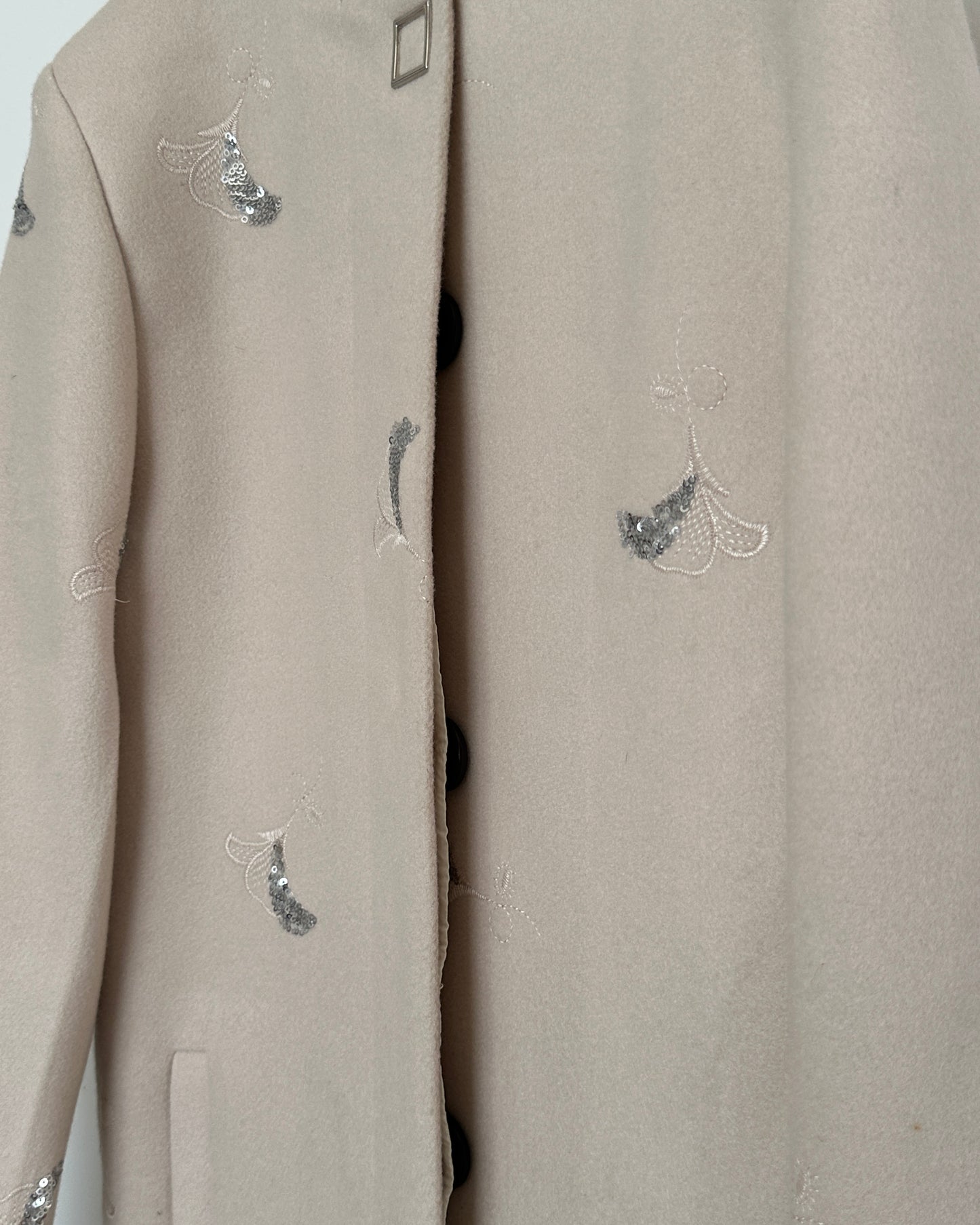 Beige winter coat with silver embroidery