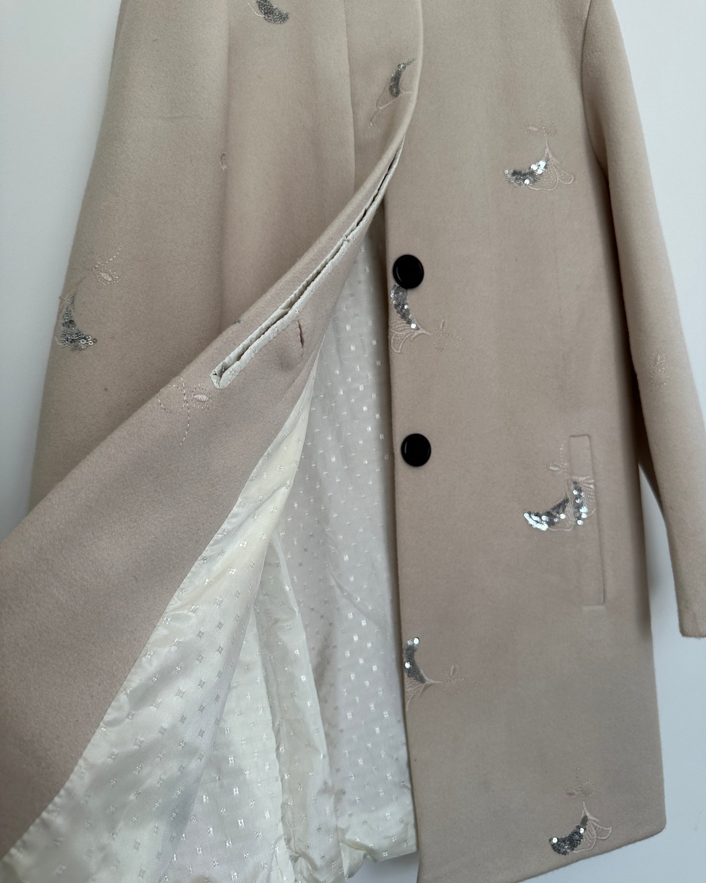 Beige winter coat with silver embroidery