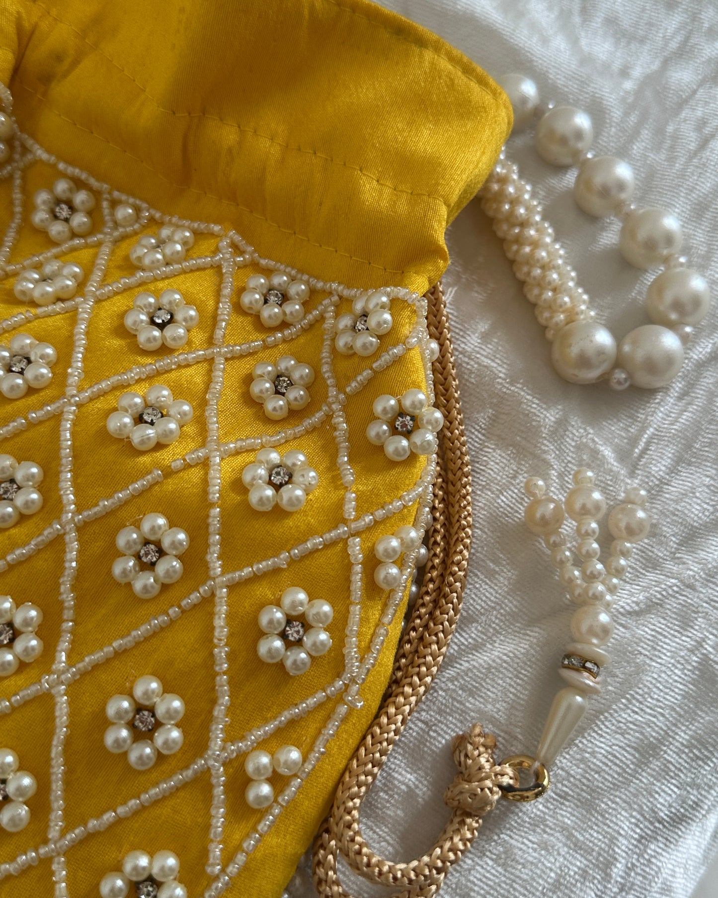 Peach Balaji Print potli bag