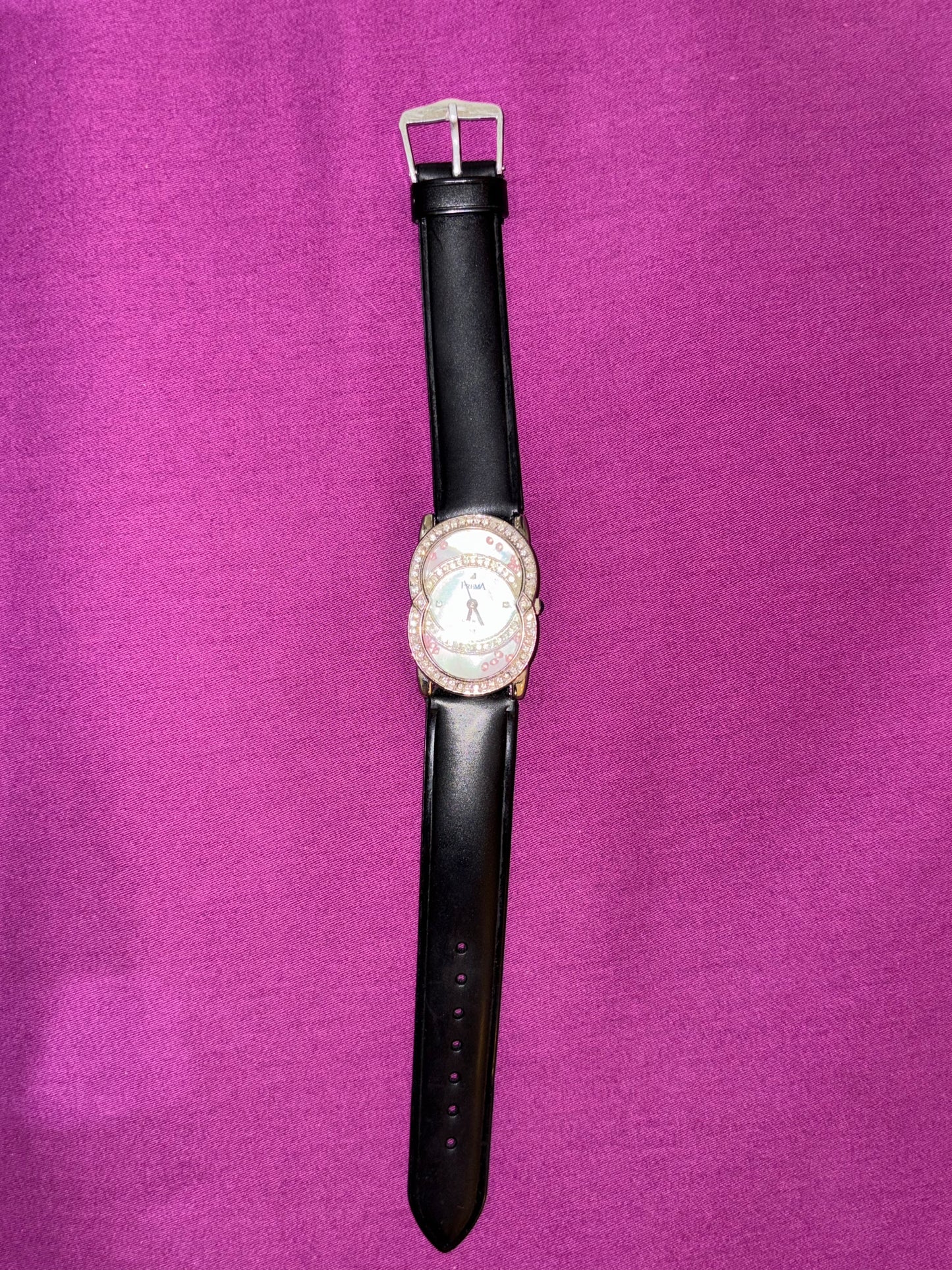 Black leather watch with studded dial