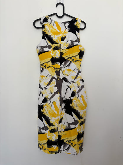 The Circle sleeveless sheath dress featuring a mustard yellow, charcoal grey, and white abstract brushstroke print.