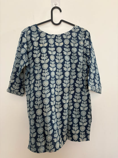 The Circle indigo cotton kurti with off-white botanical block print, round neckline, and three-quarter sleeves.
