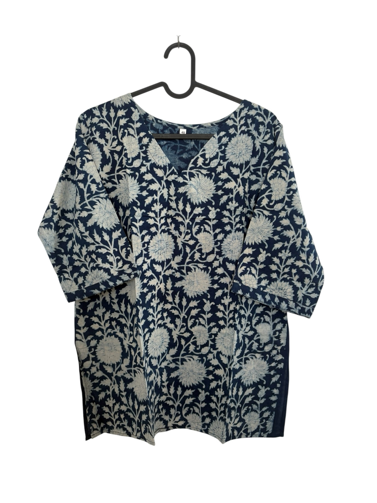 The Circle indigo cotton kurta with white hand-block floral print, V-neckline, and three-quarter sleeves.