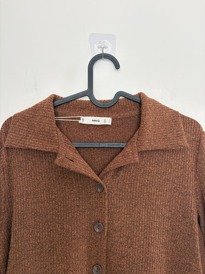 The Circle MNG brown ribbed knit button-down shirt with a classic polo collar hanging on a black hanger.