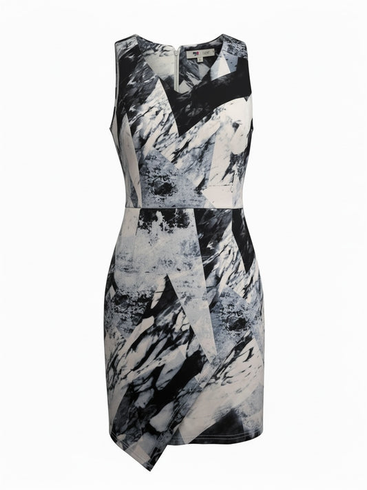 The Circle sleeveless mini dress in a monochrome geometric marble print with a V-neck and asymmetrical wrap hem.