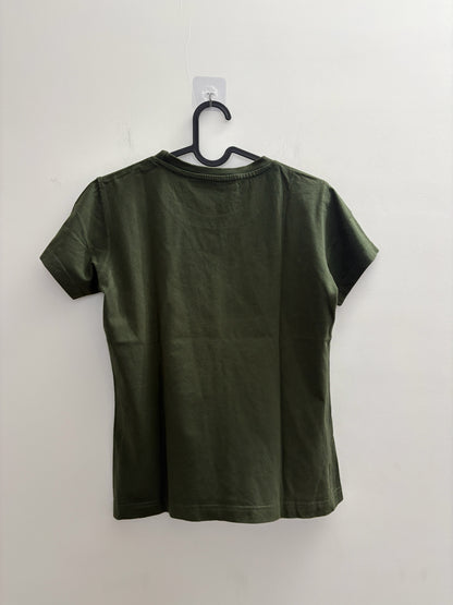 Back view of The Circle olive green crew neck t-shirt in soft cotton-blend fabric hanging on a black hanger.