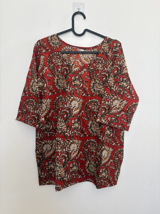 The Circle red cotton kurti top with traditional paisley and floral block-print motifs, V-neck and three-quarter sleeves