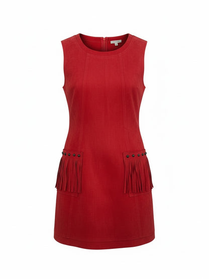 The Circle sleeveless red suede-look mini dress featuring front patch pockets with fringe trim and stud accents.