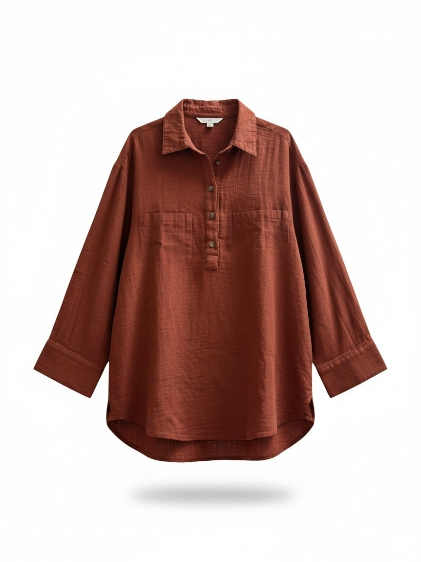The Circle rust-coloured long sleeve button-down shirt with a textured finish, classic collar, and chest pockets.
