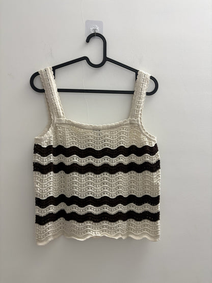 The Circle sleeveless crochet tank top in cream and dark brown wave-pattern knit with delicate scalloped edges.